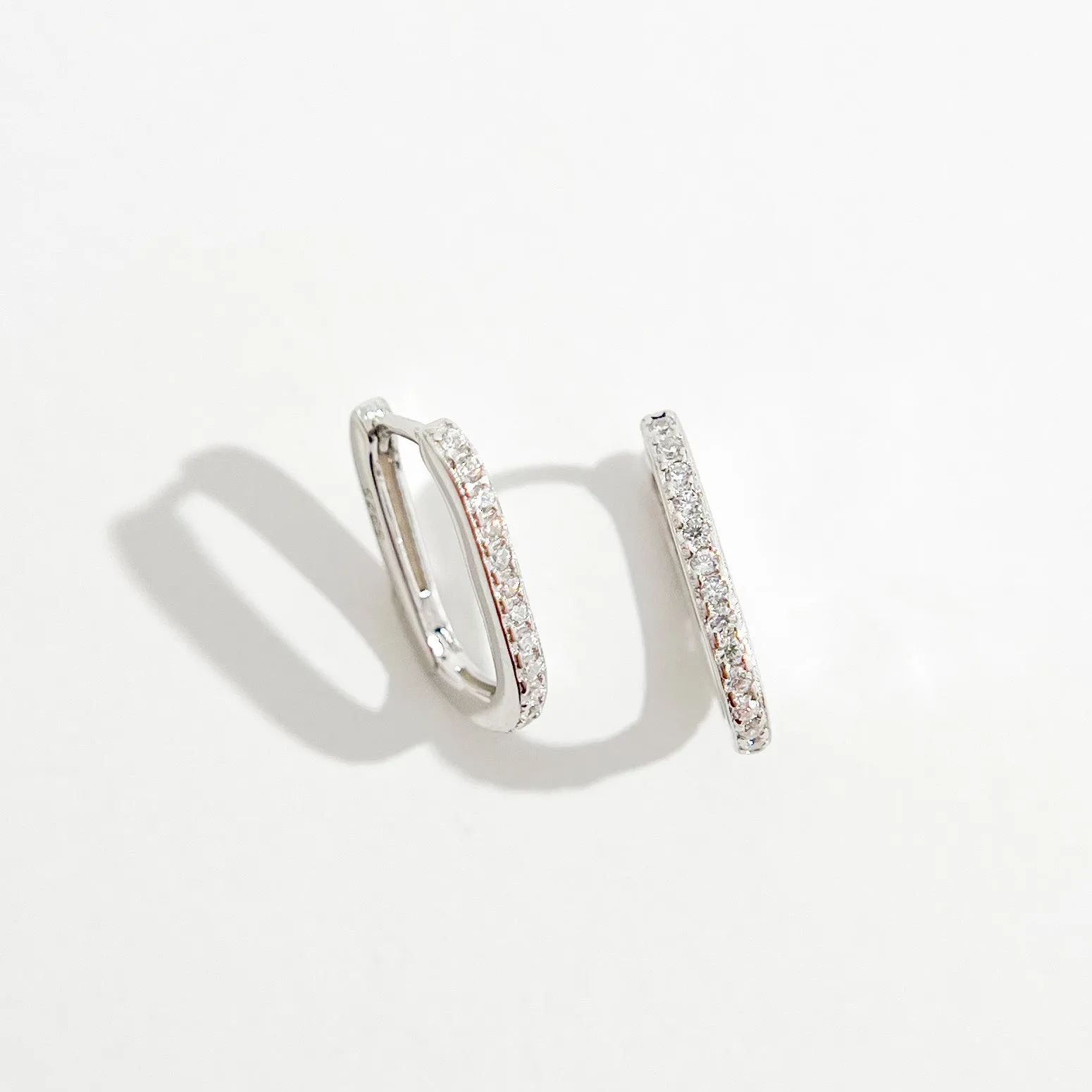 Oval Pave Huggies in Silver