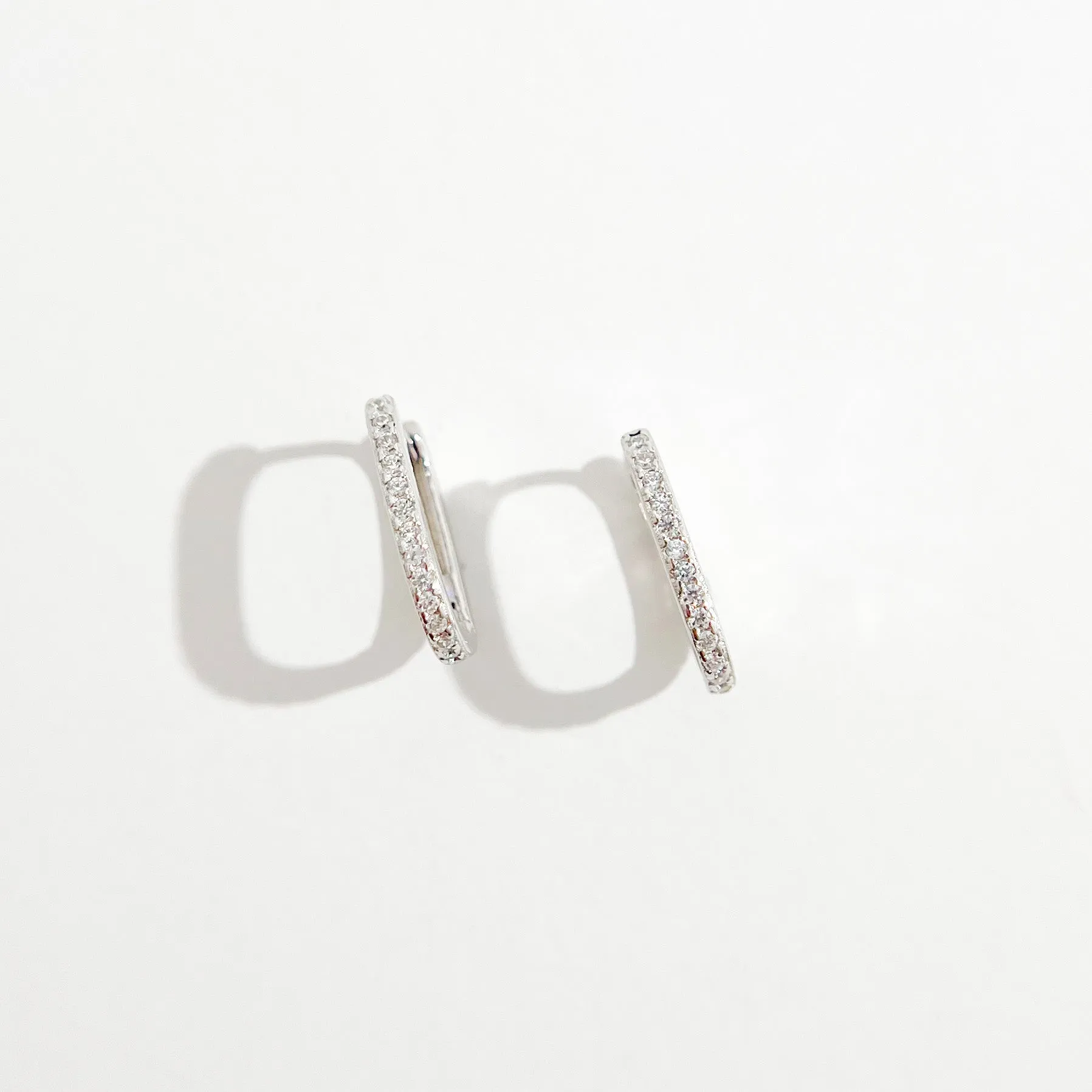 Oval Pave Huggies in Silver