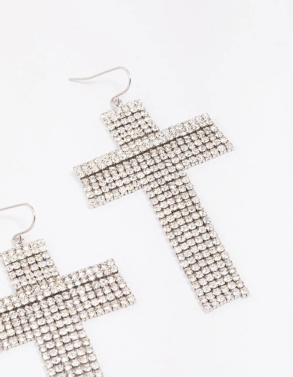 Rhodium Flowing Cross Drop Earrings